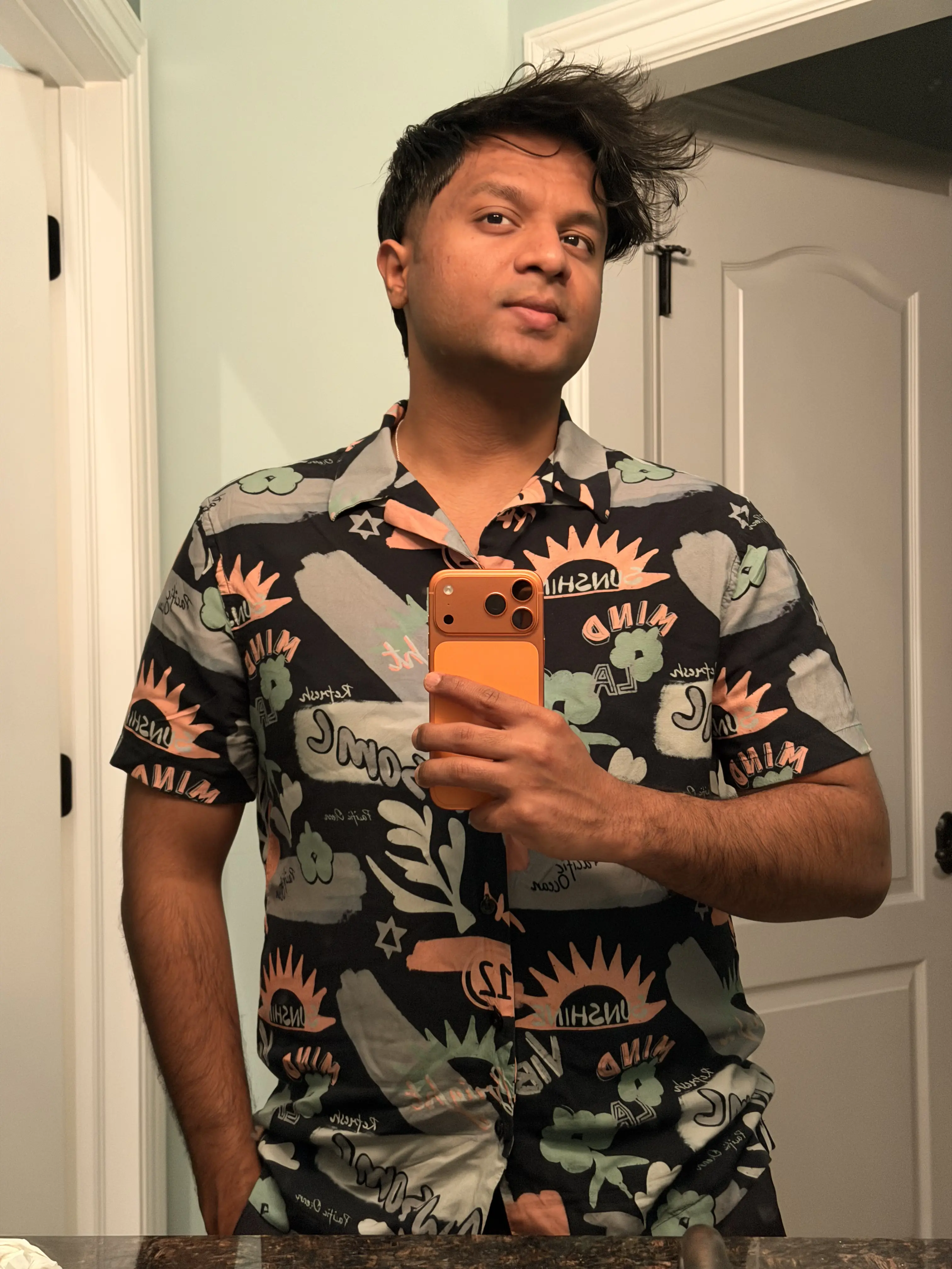 Shiva Kakumanu standing against a field backdrop.